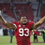 Arizona Cardinals defensive end Calais Campbell (93) celebrates after an NFL football game against the St. Louis Rams, Sunday, Nov. 9, 2014, in Glendale, Ariz. The Cardinals won 31-14. (AP Photo/Ross D. Franklin)
