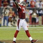 Arizona Cardinals cornerback Antonio Cromartie celebrates a stop against the San Diego Chargers during the second half of an NFL football game, Monday, Sept. 8, 2014, in Glendale, Ariz. The Cardinals won 18-17. (AP Photo/Rick Scuteri)