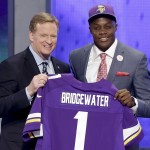 Louisville quarterback Teddy Bridgewater poses with NFL commissioner Roger Goodell after being selected by the Minnesota Vikings as the 32 pick in the first round of the 2014 NFL Draft, Thursday, May 8, 2014, in New York. (AP Photo/Frank Franklin II)