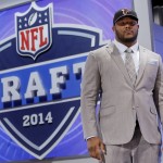 Minnesota defensive tackle Ra'Shede Hageman poses for photos after being selected by the Atlanta Falcons as the 37th pick during the second round of the 2014 NFL Draft, Friday, May 9, 2014, in New York. (AP Photo/Jason DeCrow)