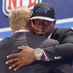 Missouri defensive end Kony Ealy hugs NFL commissioner Roger Goodell after being selected as the 60th pick by the Carolina Panthers in the second round of the 2014 NFL Draft, Friday, May 9, 2014, in New York. (AP Photo/Jason DeCrow)