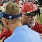 Arizona Cardinals head coach Bruce Arians, right, embraces San Diego Chargers head coach Mike McCoy after an NFL football game Monday, Sept. 8, 2014, in Glendale, Ariz. The Cardinals won 18-17. (AP Photo/Ross D. Franklin)