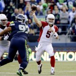 Arizona Cardinals quarterback Drew Stanton (5) passes against the Seattle Seahawks in the first half of an NFL football game, Sunday, Nov. 23, 2014, in Seattle. (AP Photo/Elaine Thompson)