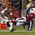 Arizona Cardinals wide receiver John Brown (12) makes a diving touchdown catch as Cincinnati Bengals defensive back R.J. Stanford (28) defends during the second half of an NFL preseason football game, Sunday, Aug. 24, 2014, in Glendale, Ariz. (AP Photo/Ross D. Franklin)