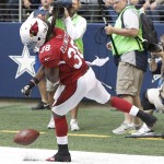 Arizona Cardinals running back Andre Ellington (38) celebrates a touchdown reception against the Dallas Cowboys during the second half of an NFL football game Sunday, Nov. 2, 2014, in Arlington, Texas. (AP Photo/Brandon Wade)