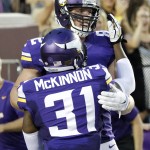  Minnesota Vikings tight end Kyle Rudolph, top, celebrates with teammate Jerick McKinnon (31) after catching a 51-yard touchdown pass during the first half of an NFL preseason football game against the Arizona Cardinals, Saturday, Aug. 16, 2014, in Minneapolis. (AP Photo/Ann Heisenfelt)