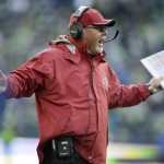 Arizona Cardinals head coach Bruce Arians gestures late in the second half of an NFL football game against the Seattle Seahawks, Sunday, Nov. 23, 2014, in Seattle. The Seahawks won 19-3. (AP Photo/Stephen Brashear)