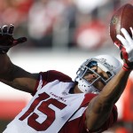 Arizona Cardinals wide receiver Michael Floyd (15) catches a pass against the San Francisco 49ers during the first half of an NFL football game in Santa Clara, Calif., Sunday, Dec. 28, 2014. (AP Photo/Tony Avelar)
