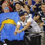 San Diego Chargers fans cheer during the first half of an NFL football game against the Arizona Cardinals, Monday, Sept. 8, 2014, in Glendale, Ariz. (AP Photo/Matt York)