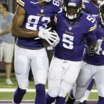  Minnesota Vikings wide receiver Rodney Smith, left, celebrates with quarterback Teddy Bridgewater (5) after catching a 2-yard touchdown pass during the second half of an NFL preseason football game against the Arizona Cardinals, Saturday, Aug. 16, 2014, in Minneapolis. The Vikings won 30-28. (AP Photo/Ann Heisenfelt)