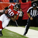 Atlanta Falcons tight end Levine Toilolo (80) makes a touch-down catch against the Arizona Cardinalsduring the first half of an NFL football game, Sunday, Nov. 30, 2014, in Atlanta. (AP Photo/John Bazemore)
