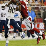 Arizona Cardinals cornerback Antonio Cromartie breaks up a pass intended for San Diego Chargers wide receiver Malcom Floyd (80) during the first half of an NFL football game, Monday, Sept. 8, 2014, in Glendale, Ariz. (AP Photo/Rick Scuteri)