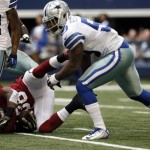 Arizona Cardinals running back Andre Ellington (38) is taken down by Dallas Cowboys middle linebacker Rolando McClain (55) during the first half of an NFL football game Tuesday, Feb. 11, 2014, in Arlington, Texas. (AP Photo/Brandon Wade)