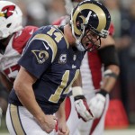 St. Louis Rams quarterback Shaun Hill (14) reacts after the Rams turned the football over on downs late in the second half of an NFL football game against the Arizona Cardinals Thursday, Dec. 11, 2014 in St. Louis. Arizona won 12-6 (AP Photo/Tom Gannam)