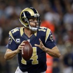 St. Louis Rams quarterback Shaun Hill (14) looks to throw during the first half of an NFL football game against the Arizona Cardinals Thursday, Dec. 11, 2014 in St. Louis. (AP Photo/Jeff Roberson)