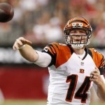 Cincinnati Bengals' Andy Dalton gets off a pass against the Arizona Cardinals during the first half of an NFL preseason football game Sunday, Aug. 24, 2014, in Glendale, Ariz. (AP Photo/Ross D. Franklin)