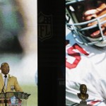 Hall of Fame inductee Aeneas Williams speaks during the Pro Football Hall of Fame enshrinement ceremony Saturday, Aug. 2, 2014, in Canton, Ohio. (AP Photo/Tony Dejak)