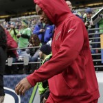 Arizona Cardinals wide receiver Larry Fitzgerald walks out of the tunnel before an NFL football game against the Seattle Seahawks, Sunday, Nov. 23, 2014, in Seattle. Fitzgerald did not play due to an injury. (AP Photo/Stephen Brashear)