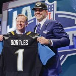 Central Florida quarterback Blake Bortles poses with NFL commissioner Roger Gooddell after being selected as the third pick by the Jacksonville Jaguars in the first round of the 2014 NFL Draft, Thursday, May 8, 2014, in New York. (AP Photo/Craig Ruttle)