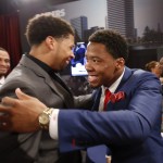 Kyle Fuller, right, from Virginia Tech, is congratulated after being selected 14th overall by the Chicago Bears in the first round of the NFL football draft, Thursday, May 8, 2014, at Radio City Music Hall in New York. (AP Photo/Jason DeCrow)