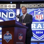 NFL commissioner Roger Goodell announces the opening of the second round of the 2014 NFL Draft, Friday, May 9, 2014, in New York. (AP Photo/Jason DeCrow)