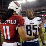 Arizona Cardinals wide receiver Larry Fitzgerald (11) greets San Diego Chargers tight end Antonio Gates (85) after an NFL football game, Monday, Sept. 8, 2014, in Glendale, Ariz. The Cardinals won 18-17. (AP Photo/Rick Scuteri)