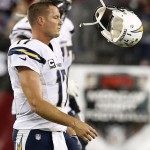 San Diego Chargers' Philip Rivers tosses his helmet after failing to get a first down on the final possession against the Arizona Cardinals during the second half of an NFL football game Monday, Sept. 8, 2014, in Glendale, Ariz. The Cardinals defeated the Chargers 18-17. (AP Photo/Ross D. Franklin)