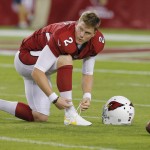 Arizona Cardinals' Drew Butler (2) ties his shoe prior to an NFL football game against the San Diego Chargers, Monday, Sept. 8, 2014, in Glendale, Ariz. (AP Photo/Rick Scuteri)