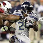 Seattle Seahawks running back Marshawn Lynch (24) runs against the Arizona Cardinals during the first half of an NFL football game, Thursday, Oct. 17, 2013, in Glendale, Ariz. (AP Photo/Rick Scuteri)