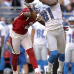 
Detroit Lions wide receiver Calvin Johnson (81) makes a catch as Arizona Cardinals cornerback Patrick Peterson (21) defends during the first half of an NFL football game on Sunday, Dec. 16, 2012, in Glendale, Ariz. (AP Photo/Paul Connors)