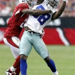 Dallas Cowboys wide receiver Dez Bryant (88) pulls in a pass as Arizona Cardinals cornerback Patrick Peterson defends during the first half of a preseason NFL football game on Saturday, Aug. 17, 2013, in Glendale, Ariz. (AP Photo/Rick Scuteri)
