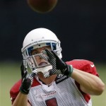 Arizona Cardinals' Robby Toma makes a catch at NFL football training camp practice on Monday, Aug. 5, 2013, in Glendale, Ariz. (AP Photo/Ross D. Franklin)