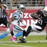 Arizona Cardinals cornerback Patrick Peterson (21) intercepts a pass as Carolina Panthers wide receiver Steve Smith (89) defends during the first half of a NFL football game, Sunday, Oct. 6, 2013, in Glendale, Ariz. (AP Photo/Rick Scuteri)
