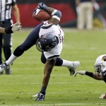 Houston Texans running back Ben Tate, left, is tackled by Arizona Cardinals free safety Tyrann Mathieu, right, during the first half of an NFL football game Sunday, Nov. 10, 2013, in Glendale, Ariz. (AP Photo/Ross D. Franklin)