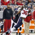 Houston Texans' D.J. Swearinger (36) intercepts a pass intended for Arizona Cardinals' Rob Housler during the first half of an NFL football game on Sunday, Nov. 10, 2013, in Glendale, Ariz. (AP Photo/Ross D. Franklin)