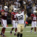New Orleans Saints strong safety Kenny Vaccaro (32) celebrates his interception in the second half of an NFL football game against the Arizona Cardinals in New Orleans, Sunday, Sept. 22, 2013. (AP Photo/Bill Haber)