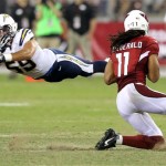 San Diego Chargers linebacker Andrew Gachkar (59) can't hold onto a pass intended for Arizona Cardinals Larry Fitzgerald (11) during the second half of a preseason NFL football game, Saturday, Aug. 24, 2013, in Glendale, Ariz. (AP Photo/Rick Scuteri)