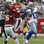Arizona Cardinals' Tony Jefferson (36) collides with teammate Curtis Taylor (26) as Jefferson intercepts a pass intended for Dallas Cowboys' Dwayne Harris (17) in the first half during a preseason NFL football game on Saturday, Aug. 17, 2013, in Glendale, Ariz. (AP Photo/Ross D. Franklin)