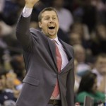 Memphis Grizzlies head coach Dave Joerger calls to players in the first half of an NBA basketball game against the Phoenix Suns on Friday, Jan. 10, 2014, in Memphis, Tenn. (AP Photo/Lance Murphey)