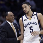 Memphis Grizzlies coach Lionel Hollins, left, talks to Austin Daye (5) during the second half of an NBA basketball game against the Phoenix Suns in Memphis, Tenn., Tuesday, Feb. 5, 2013. The Suns defeated the Grizzlies 96-90. (AP Photo/Danny Johnston)