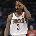 Milwaukee Bucks' Brandon Jennings reacts to his 3-point basket against the Phoenix Suns during the second half of an NBA basketball game Tuesday, Jan. 8, 2013, in Milwaukee. (AP Photo/Jeffrey Phelps)