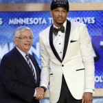 NBA Commissioner David Stern, left, shakes hands with Colorado's Andre Roberson, who was selected by the Minnesota Timberwolves in the first round of the NBA basketball draft, Thursday, June 27, 2013, in New York. (AP Photo/Kathy Willens)