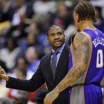 Phoenix Suns head coach Lindsey Hunter, left, talks with Michael Beasley (0) during the first half of an NBA basketball game against the Washington Wizards, Saturday, March 16, 2013, in Washington. (AP Photo/Nick Wass)
