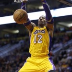 Los Angeles Lakers' Dwight Howard dunks against the Phoenix Suns during the first half on an NBA basketball game, Wednesday, Jan. 30, 2013, in Phoenix. (AP Photo/Matt York)
