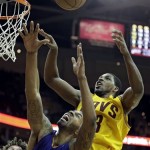 Cleveland Cavaliers' Tristan Thompson, right, goes up for a rebound against Phoenix Suns' Markieff Morris (11) in the fourth quarter of an NBA basketball game Sunday, Jan. 26, 2014, in Cleveland. The Suns won 99-90. (AP Photo/Mark Duncan)