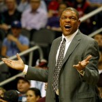 Los Angeles Clippers head coach Doc Rivers reacts to a call in the first quarter of an NBA preseason basketball game against the Phoenix Suns on Tuesday, Oct. 15, 2013, in Phoenix. (AP Photo/Rick Scuteri)