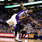 Phoenix Suns' Marcus Morris (15) is flagrantly fouled by Atlanta Hawks' Jeff Teague during the second half of an NBA basketball game, Friday, March 1, 2013, in Phoenix. The Suns won 92-87. (AP Photo/Matt York)
