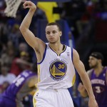 Golden State Warriors' Stephen Curry celebrates after scoring in the second half of an NBA basketball game against the Phoenix Suns Saturday, Feb. 2, 2013, in Oakland, Calif. (AP Photo/Ben Margot)
