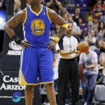  Golden State Warriors' Jermaine O'Neal stands on the court after being called for a foul during the first half of an NBA basketball game against the Phoenix Suns, Saturday, Feb. 8, 2014, in Phoenix. (AP Photo/Ross D. Franklin)