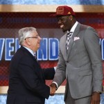 NBA Commissioner David Stern, left, shakes hands with UNLV's Anthony Bennett, who was selected first overall by the Cleveland Cavaliers in the NBA basketball draft, Thursday, June 27, 2013, in New York. (AP Photo/Jason DeCrow)